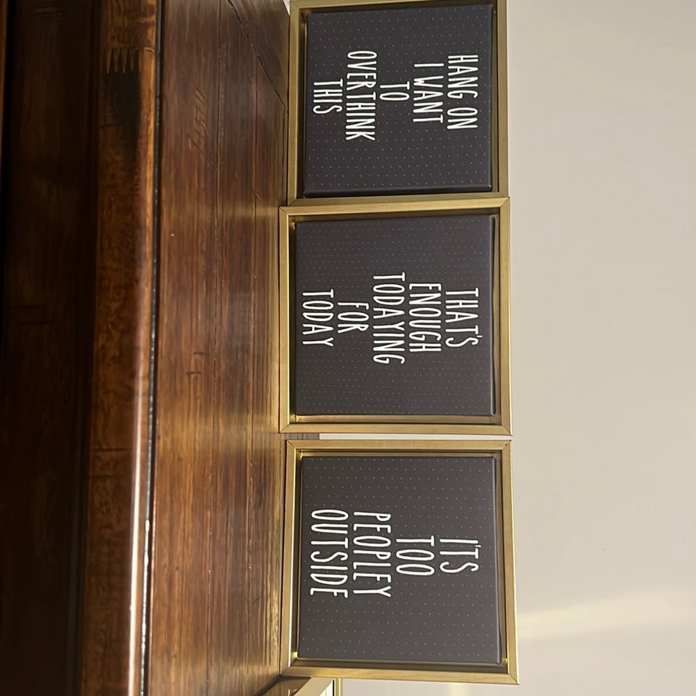 Gold and black signs